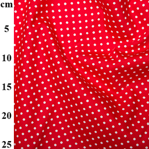 bright red polka dot fabric