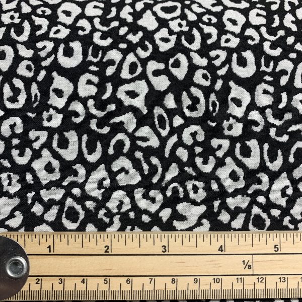 black and white animal jacquard with ruler