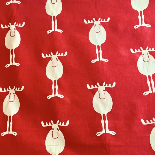 reindeer print on red fabric